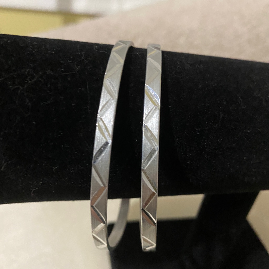 Two Silver Tone Bangles